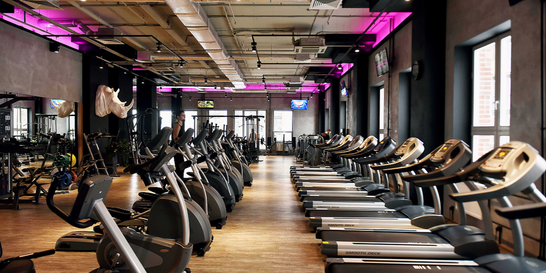 24/7 gym layout showing equipment zones, walkways and visibility across the gym floor