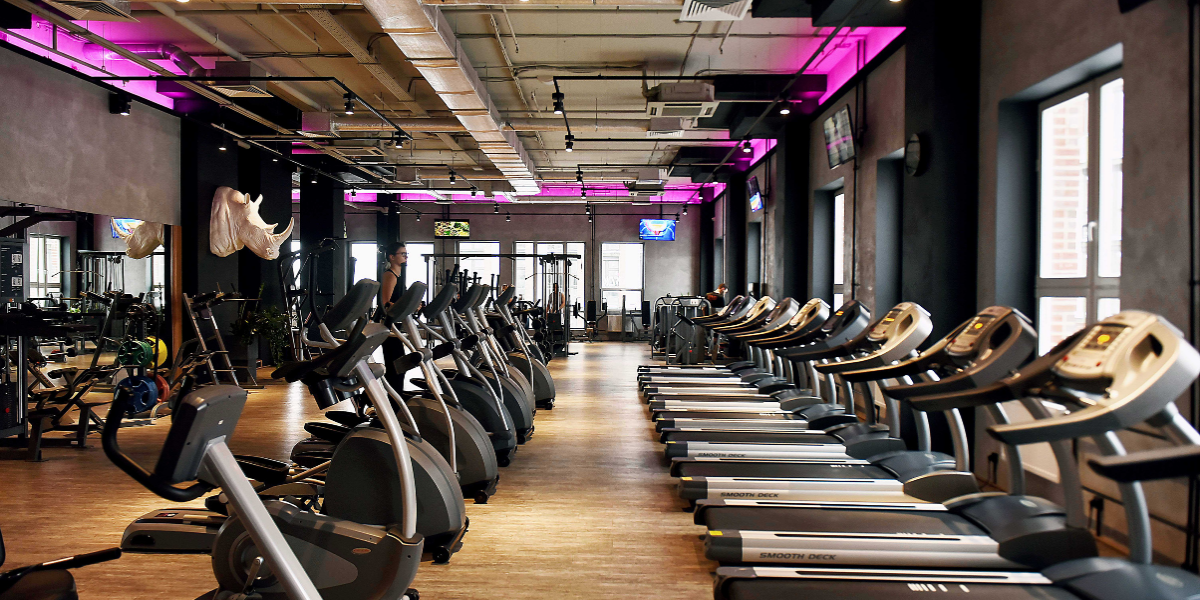 24/7 gym layout showing equipment zones, walkways and visibility across the gym floor