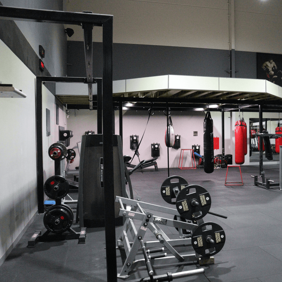 Gym floor with strength equipment, weights, and training area during safety audit inspection